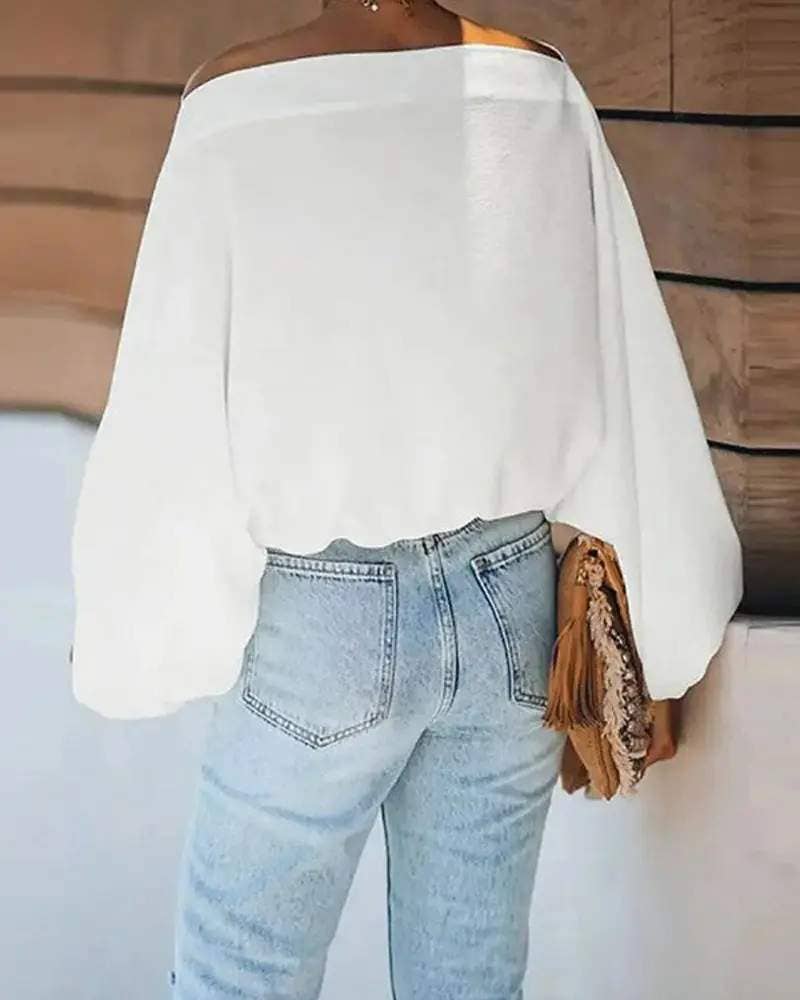 Abstract figure print lantern sleeve top